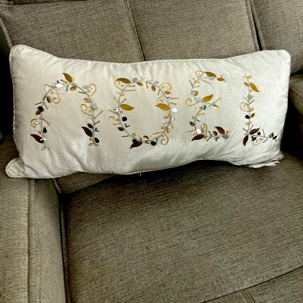 Christmas design throw pillow with the word Noel.  New with No tags.